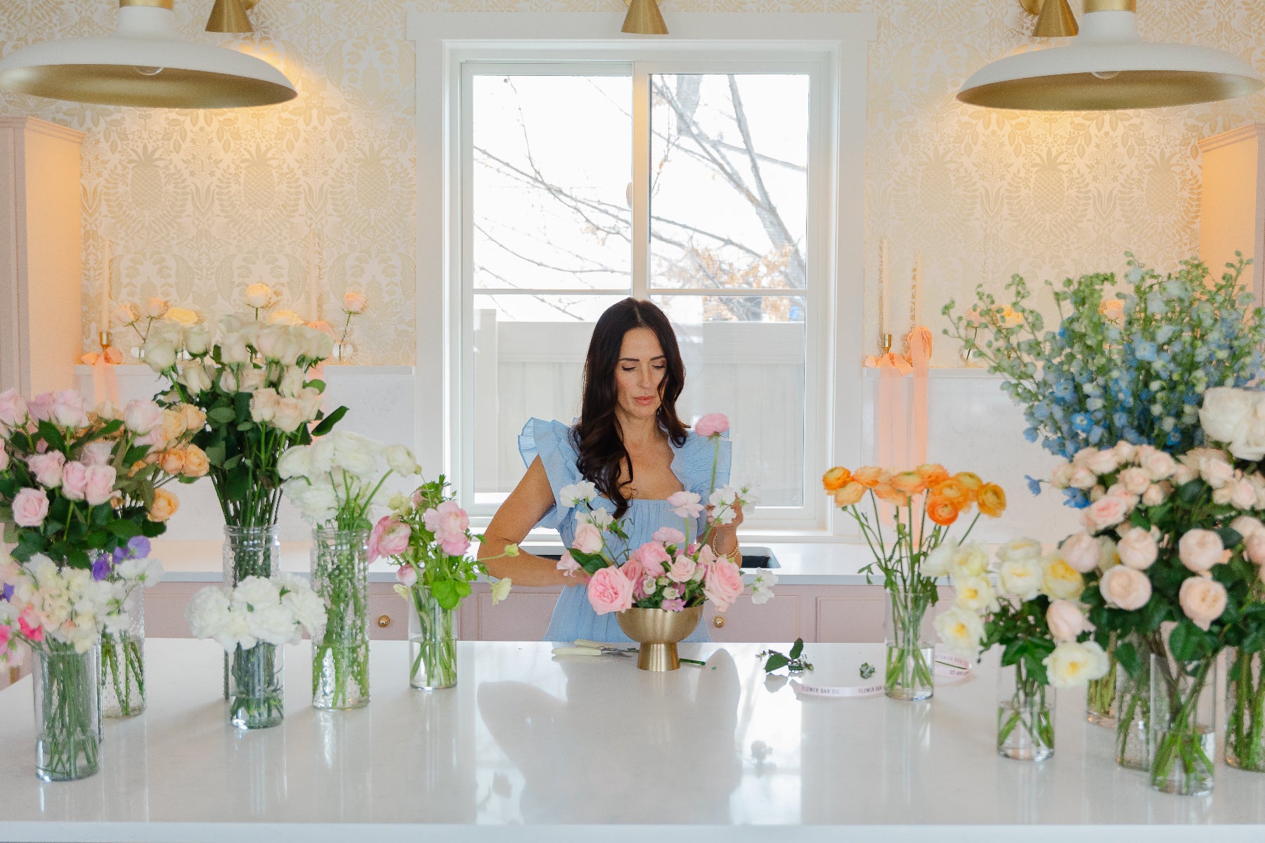 A woman arranging flowers
