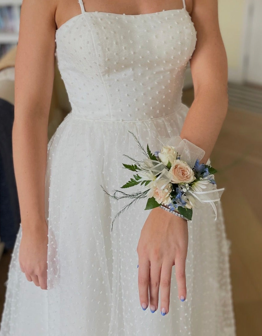woman wearing wrist corsage