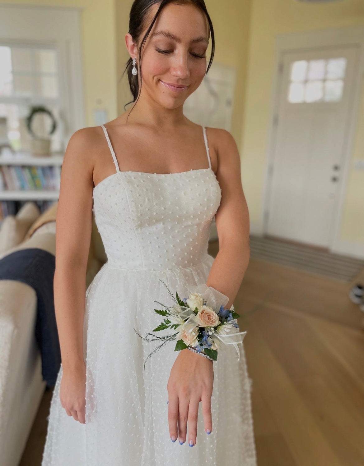 Woman wearing a floral wrist corsage
