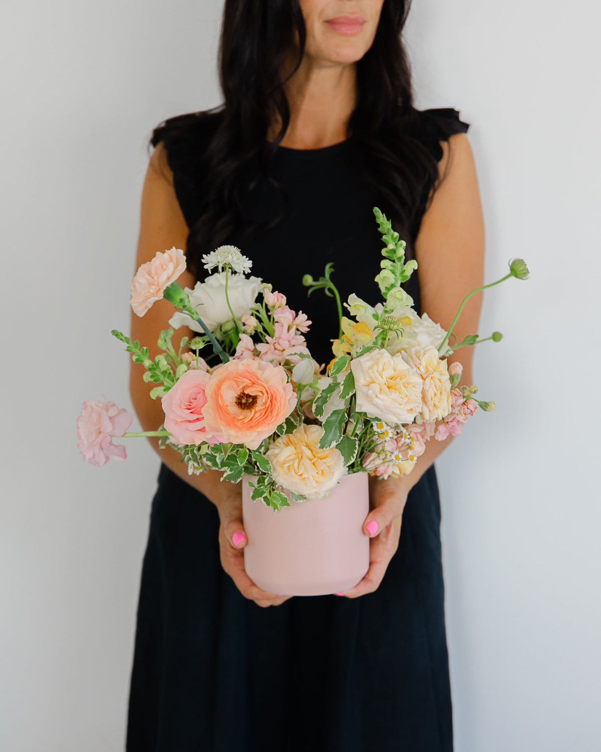 medium floral arrangement in light link vase