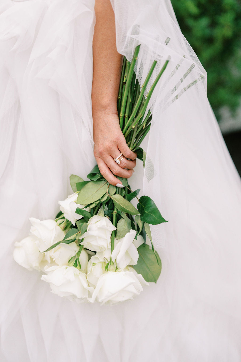 white rose wedding bouquet held by Utah bride