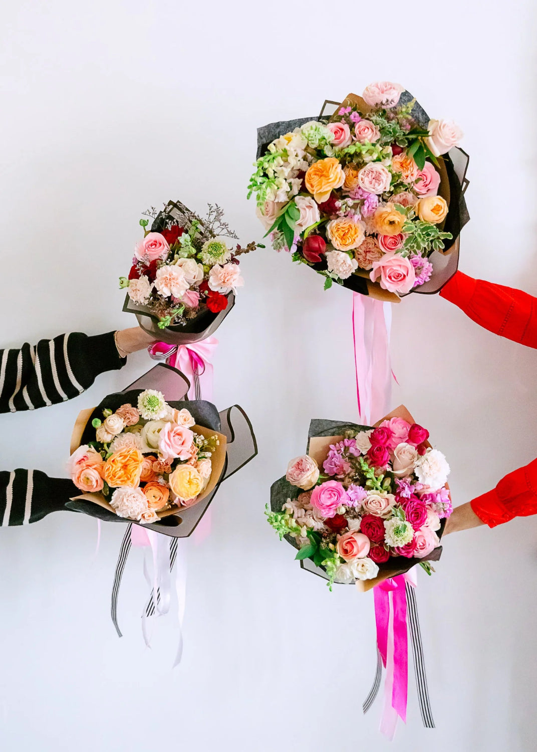 Classic hand-tied bouquet with fresh flowers and natural wrapping