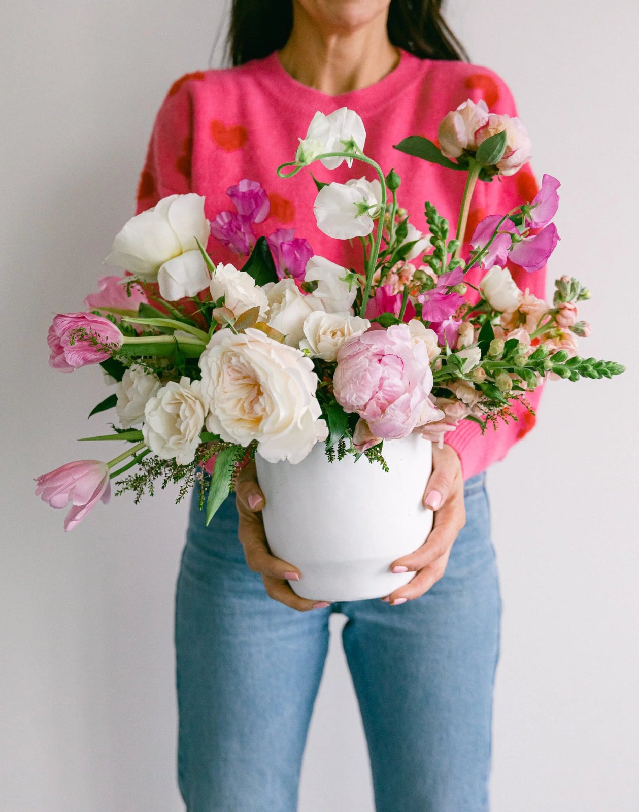Premium vase arrangement with fresh seasonal flowers and lush greenery